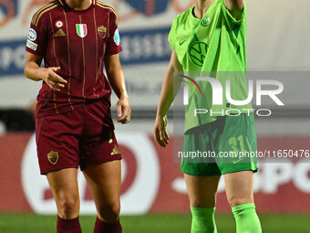 Evelyne Viens of A.S. Roma Femminile and Marina Hegering of VfL Wolfsburg participate in Group A - Day 1 of the UEFA Women's Champions Leagu...