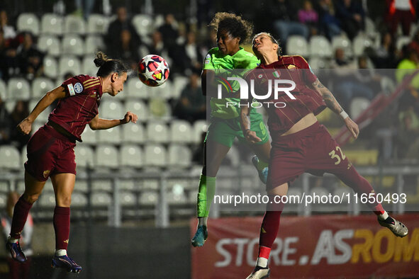 Lucia Di Guglielmo of A.S. Roma Femminile, Lineth Beerensteyn of VfL Wolfsburg, and Elena Linari of A.S. Roma Femminile are in action during...