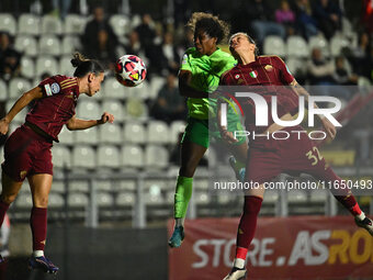 Lucia Di Guglielmo of A.S. Roma Femminile, Lineth Beerensteyn of VfL Wolfsburg, and Elena Linari of A.S. Roma Femminile are in action during...