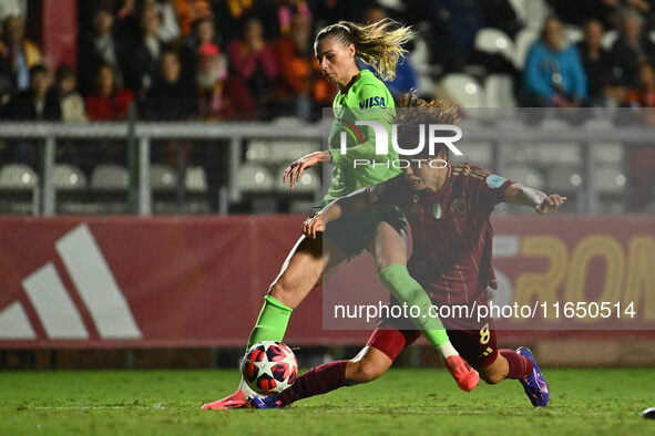 Lena Lattwein of VfL Wolfsburg and Saki Kumagai of A.S. Roma Femminile are in action during Group A - Day 1 of the UEFA Women's Champions Le...