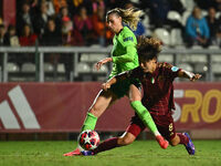 Lena Lattwein of VfL Wolfsburg and Saki Kumagai of A.S. Roma Femminile are in action during Group A - Day 1 of the UEFA Women's Champions Le...