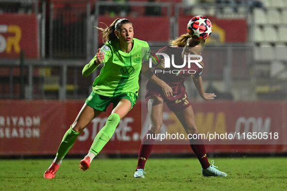 Jule Brand of VfL Wolfsburg and Frederikke Thogersen of A.S. Roma Femminile are in action during Group A - Day 1 of the UEFA Women's Champio...