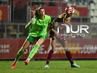 Jule Brand of VfL Wolfsburg and Frederikke Thogersen of A.S. Roma Femminile are in action during Group A - Day 1 of the UEFA Women's Champio...