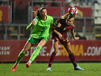 Jule Brand of VfL Wolfsburg and Frederikke Thogersen of A.S. Roma Femminile are in action during Group A - Day 1 of the UEFA Women's Champio...