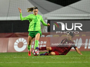 Jule Brand of VfL Wolfsburg and Saki Kumagai of A.S. Roma Femminile are in action during Group A - Day 1 of the UEFA Women's Champions Leagu...