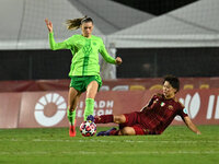 Jule Brand of VfL Wolfsburg and Saki Kumagai of A.S. Roma Femminile are in action during Group A - Day 1 of the UEFA Women's Champions Leagu...