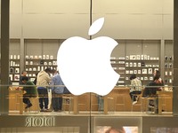 Customers experience Apple products at the Taikoo Li Apple Store in Chengdu, China, on October 8, 2024. (