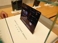 A Huawei Mate XT triple foldable screen mobile phone is displayed at a Huawei store located at IFS International Financial Center on Chunxi...