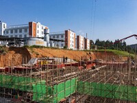 Workers work at the construction site of the 2024 help workshop in Congjiang County, Guizhou Province, China, on October 8, 2024. (