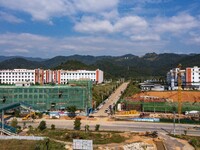 Workers work at the construction site of the 2024 help workshop in Congjiang County, Guizhou Province, China, on October 8, 2024. (