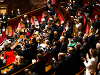 In Paris, France, on October 8, 2024, deputies of the left-wing party applaud Olivier Faure's speech during the debate on the motion of cens...