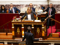 Yael Braun-Pivet, President of the National Assembly, argues with Olivier Faure, deputy of the Socialistes et Apparentes, during the debate...