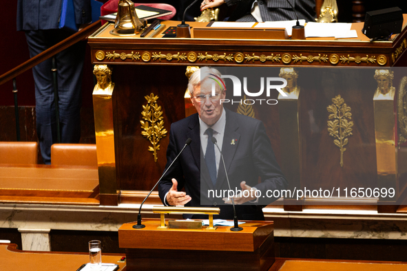 Michel Barnier, the French Prime Minister, speaks during the debate on the motion of censure of his government at the National Assembly in P...