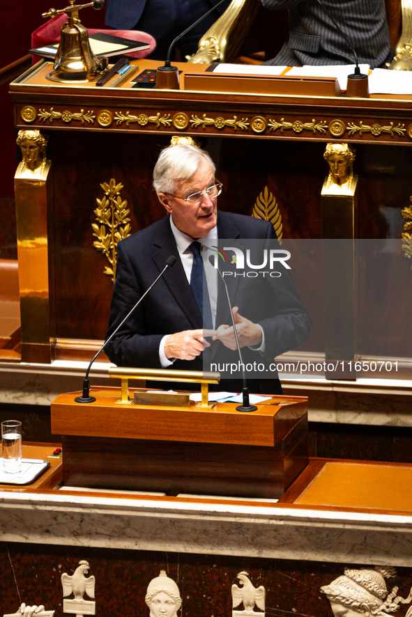 Michel Barnier, the French Prime Minister, speaks during the debate on the motion of censure of his government at the National Assembly in P...