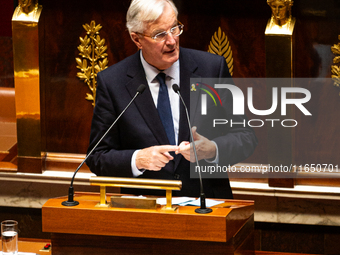 Michel Barnier, the French Prime Minister, speaks during the debate on the motion of censure of his government at the National Assembly in P...