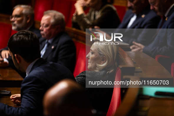 Marine Le Pen, President of the Rassemblement National group, is seen during the debate on the motion of censure of Michel Barnier's governm...