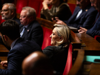 Marine Le Pen, President of the Rassemblement National group, is seen during the debate on the motion of censure of Michel Barnier's governm...