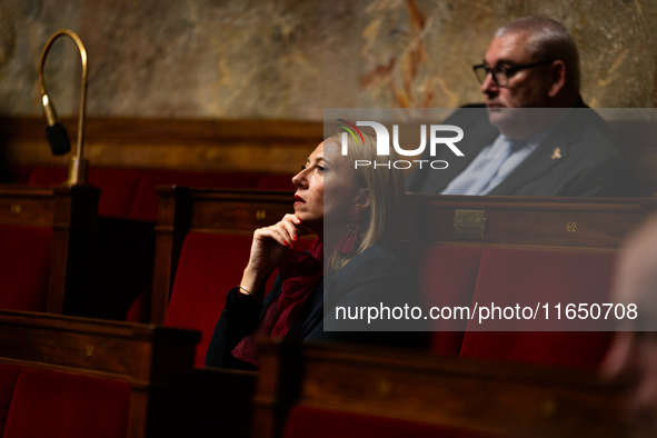 Stephanie Galzy, deputy of the Rassemblement National group, is seen during the debate on the motion of censure of Michel Barnier's governme...