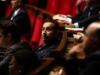 Sebastien Chenu, deputy of the Rassemblement National group, is seen during the debate on the motion of censure of Michel Barnier's governme...