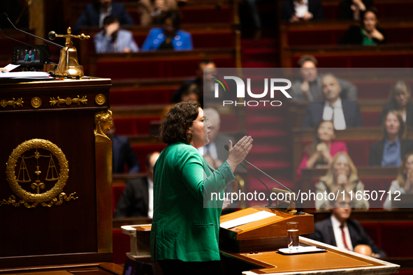 Cyrielle Chatelain, President of the Ecologiste et Social group, speaks during the debate on the motion of censure of Michel Barnier's gover...