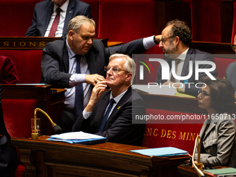 Michel Barnier, the French Prime Minister, is seen during the debate on the motion of censure of his government at the National Assembly in...