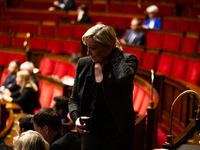 Marine Le Pen, President of the Rassemblement National group, is seen during the debate on the motion of censure of Michel Barnier's governm...