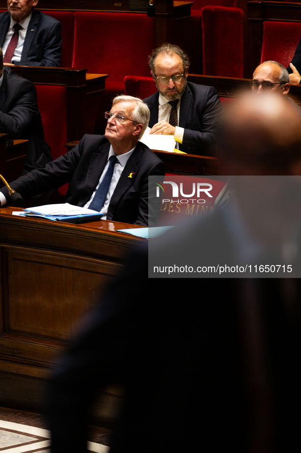 Michel Barnier, the French Prime Minister, is seen during the debate on the motion of censure of his government at the National Assembly in...