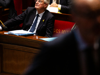 Michel Barnier, the French Prime Minister, is seen during the debate on the motion of censure of his government at the National Assembly in...