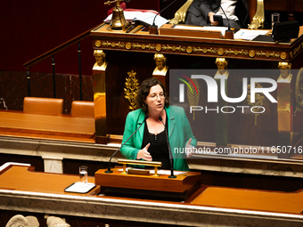 Cyrielle Chatelain, President of the Ecologiste et Social group, speaks during the debate on the motion of censure of Michel Barnier's gover...