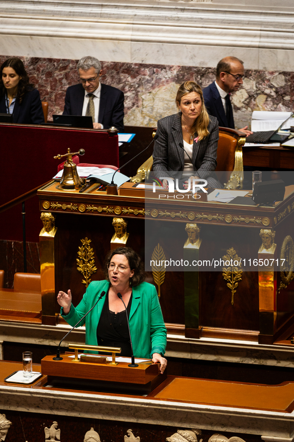 Cyrielle Chatelain, President of the Ecologiste et Social group, speaks during the debate on the motion of censure of Michel Barnier's gover...