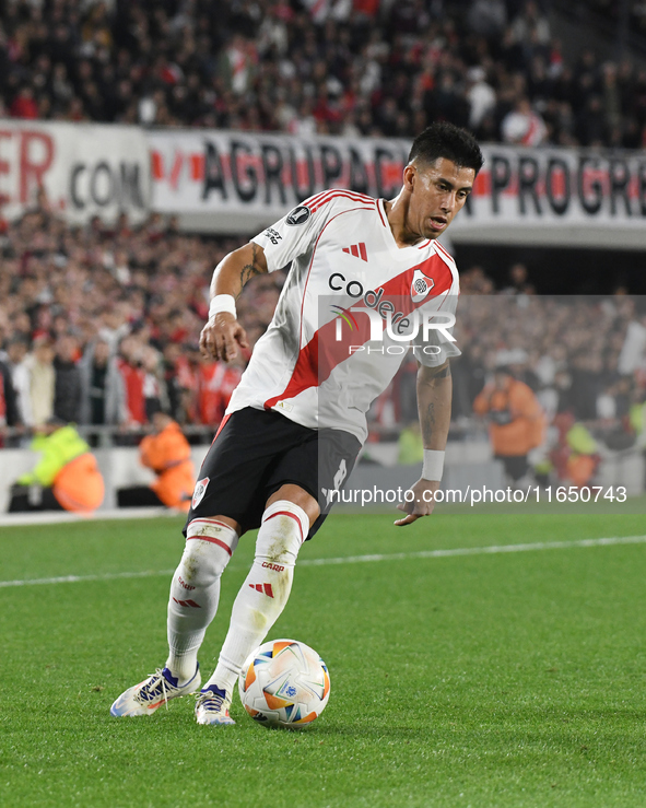 Maximiliano Meza of River Plate participates in a Copa Libertadores match between River Plate and Colo Colo at Estadio Mas Monumental Antoni...