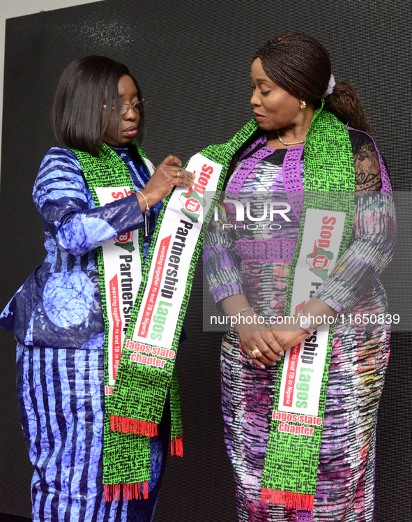 Claudiana Ibijoke Sanwo-Olu, First Lady of Lagos State, inducts Oluremi Hamzat, wife of the Deputy Governor of Lagos State, as a member of t...