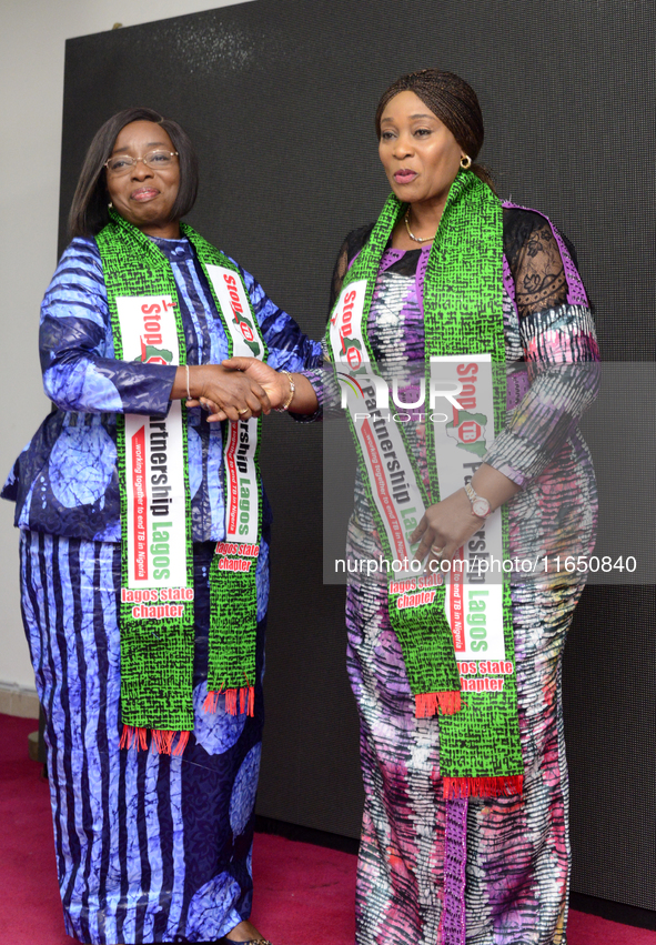 Claudiana Ibijoke Sanwo-Olu, First Lady of Lagos State, inducts Oluremi Hamzat, wife of the Deputy Governor of Lagos State, as a member of t...