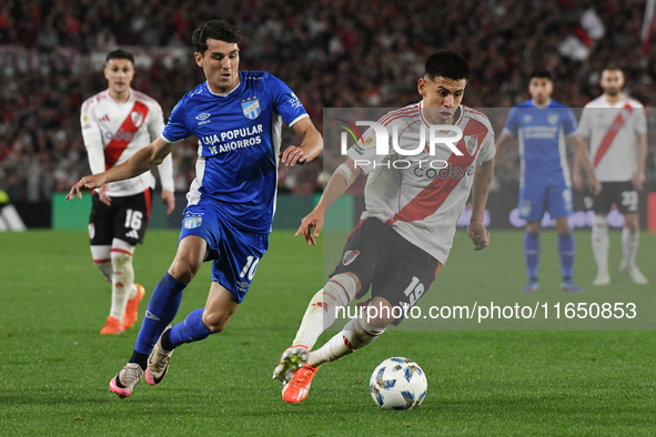 Claudio Echeverri of River Plate participates in a Liga Profesional de Futbol match between River Plate and Atletico Tucuman at Estadio Mas...