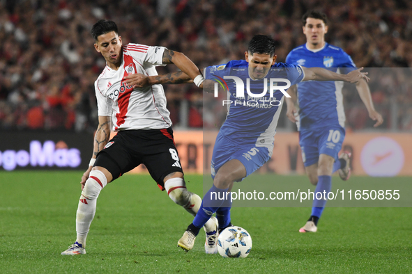 Maximiliano Meza of River Plate participates in a Liga Profesional de Futbol match between River Plate and Atletico Tucuman at Estadio Mas M...