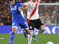 Leandro Gonzalez Pires of River Plate participates in a Liga Profesional de Futbol match between River Plate and Atletico Tucuman at Estadio...