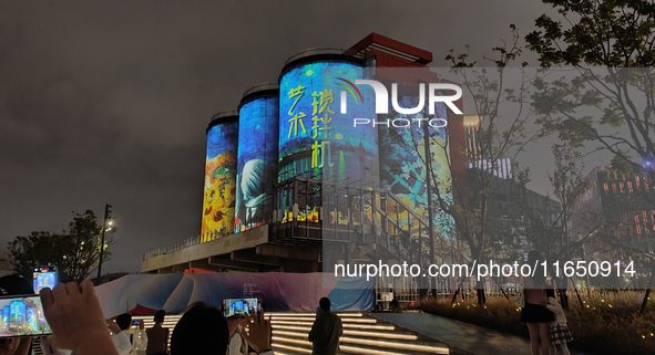 The Shanghai Tourism Festival International Light Festival creates a night view of urban industrial sites in Shanghai, China, on October 7,...