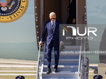 President Joe Biden arrives at General Mitchell International Airport in Milwaukee, Wisconsin, on October 8, 2024. (