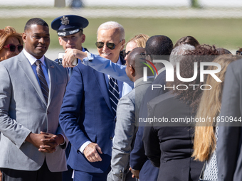 President Joe Biden arrives at General Mitchell International Airport in Milwaukee, Wisconsin, on October 8, 2024. (