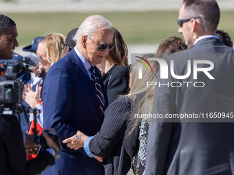 President Joe Biden arrives at General Mitchell International Airport in Milwaukee, Wisconsin, on October 8, 2024. (