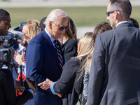 President Joe Biden arrives at General Mitchell International Airport in Milwaukee, Wisconsin, on October 8, 2024. (