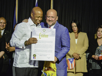 New York City Mayor Eric Adams presents the CITATION award, the highest recognition of Hispanic achievement, to George W. Contreras in New Y...