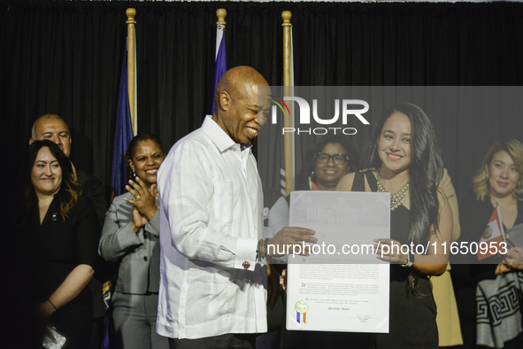 New York City Mayor Eric Adams presents the CITATION award, the highest recognition for Hispanic achievement, to Jessenia Mata in New York C...