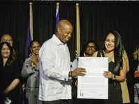 New York City Mayor Eric Adams presents the CITATION award, the highest recognition for Hispanic achievement, to Jessenia Mata in New York C...