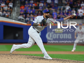 New York Mets starting pitcher Sean Manaea #59 throws during the fifth inning in Game 3 of a baseball NL Division Series against the Philade...