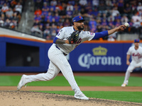 New York Mets starting pitcher Sean Manaea #59 throws during the fifth inning in Game 3 of a baseball NL Division Series against the Philade...