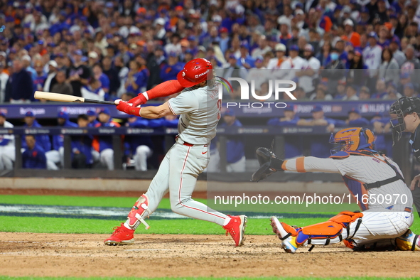 Bryce Harper #3 of the Philadelphia Phillies singles during the eighth inning in Game 3 of a baseball NL Division Series against the New Yor...