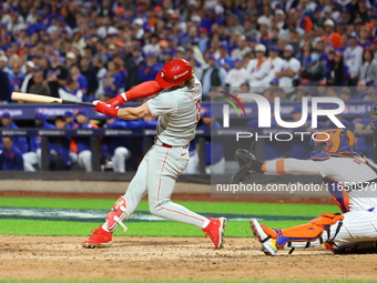 Bryce Harper #3 of the Philadelphia Phillies singles during the eighth inning in Game 3 of a baseball NL Division Series against the New Yor...