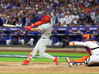 Bryce Harper #3 of the Philadelphia Phillies singles during the eighth inning in Game 3 of a baseball NL Division Series against the New Yor...