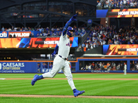 Jesse Winker #3 of the New York Mets rounds the bases after hitting a solo home run during the fourth inning in Game 3 of a baseball NL Divi...